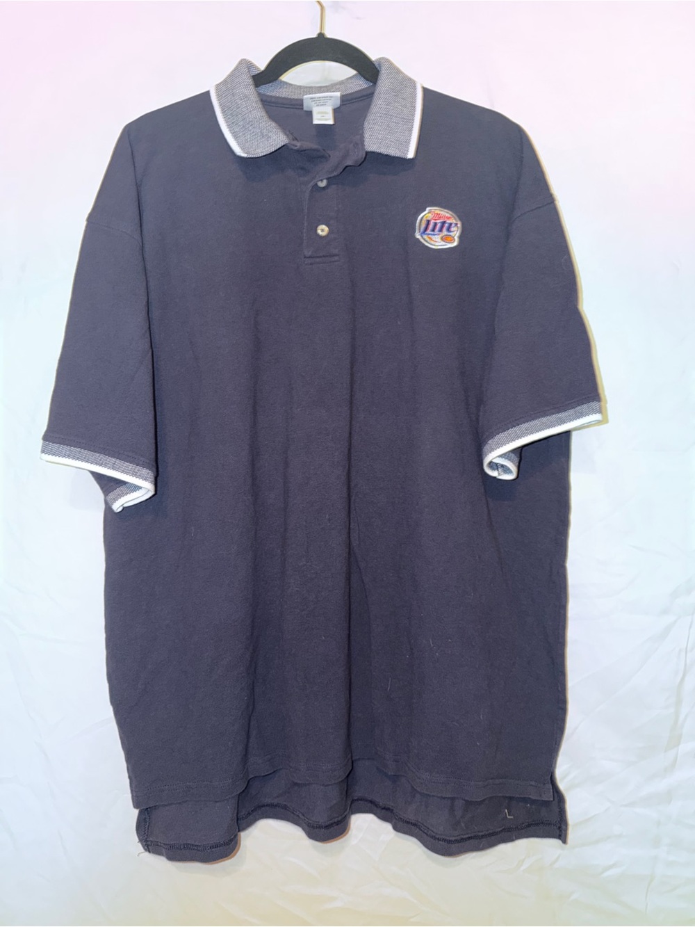 Anvil Navy Polo with Gray Trim and Embroidered Logo